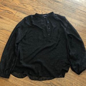 Very nice woman’s black shirt size S very cute